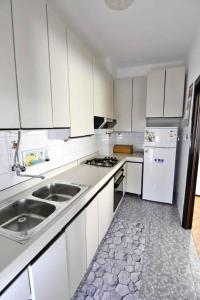 Kuchyň nebo kuchyňský kout v ubytování Apartment Diva