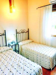 Postel nebo postele na pokoji v ubytování La Casita De La Montaña + 17 fotografií