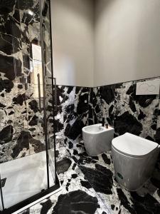 Koupelna v ubytování Il Vicolo B&B GIUBILEO + 37 fotografií
