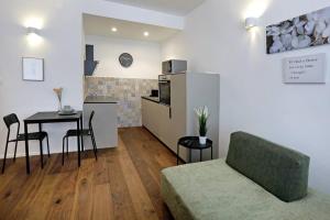 Kuchyň nebo kuchyňský kout v ubytování Wally apartment + 9 fotografií