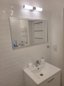 Ένα μπάνιο στο PAW Apartament 2 +25 φωτογραφίες
