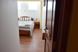 Postel nebo postele na pokoji v ubytování Sueños Sambleños