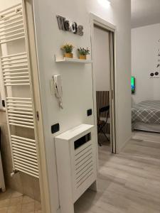 Letto o letti in una camera di Casa di Arianna in centro storico a Vimercate