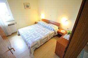 Łóżko lub łóżka w pokoju w obiekcie Apartment Zadar - Diklo 5880d