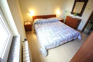 Łóżko lub łóżka w pokoju w obiekcie Apartment Zadar - Diklo 5880d