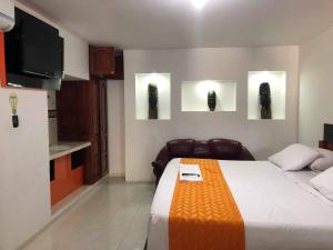 Voodi või voodid majutusasutuse Hotel Yurupary AMAZONAS toas