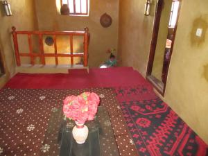 A bed or beds in a room at DAR Awlim