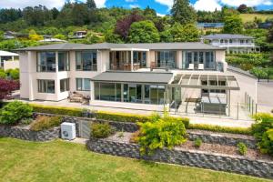 an aerial view of a large house with a garden at OMAIO - Taupo in Taupo