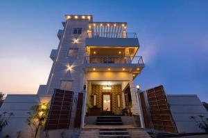 a tall building with lights on top of it at Bairava Bliss Inn in Rāmeswaram