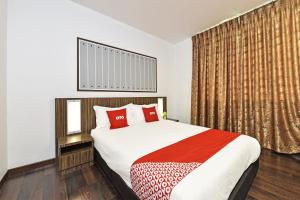 Postel nebo postele na pokoji v ubytování 4S Hotel