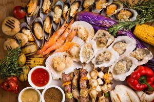 a table with many different types of seafood and vegetables at China Hotel Guangzhou in Guangzhou +55 photos