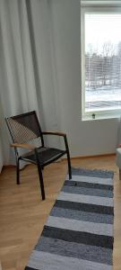 Χώρος καθιστικού στο Apartment Kauppatie, kolmelle