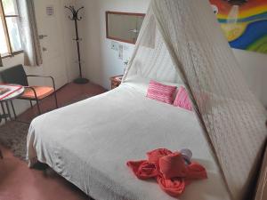 Postel nebo postele na pokoji v ubytování Temazcal casa gema