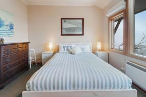 Postel nebo postele na pokoji v ubytování Mawson 5 + 1 fotografie