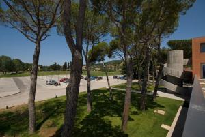 an aerial view of a parking lot with trees at Terme Di Venturina - Toscana in Venturina Terme