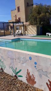 The swimming pool at or close to Oasis Montana peace in Tabernas Desert