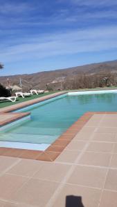 The swimming pool at or close to Oasis Montana peace in Tabernas Desert