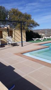 The swimming pool at or close to Oasis Montana peace in Tabernas Desert