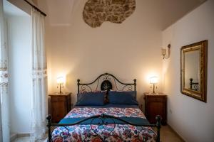 Postel nebo postele na pokoji v ubytování Corcioli B&B