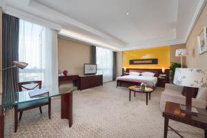 TV a/nebo společenská místnost v ubytování Park Plaza Changzhou, A member of Radisson Hotel&Resorts