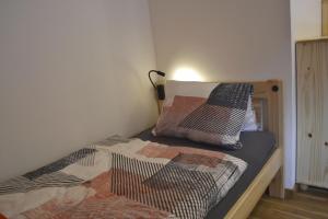 Ένα ή περισσότερα κρεβάτια σε δωμάτιο στο apartmán pod Ještědem