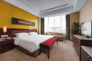 Postel nebo postele na pokoji v ubytování Park Plaza Changzhou, A member of Radisson Hotel&Resorts