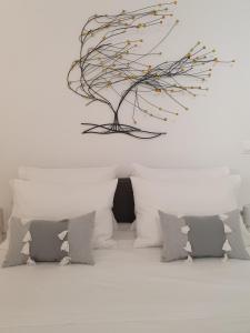 Posteľ alebo postele v izbe v ubytovaní Kalamia's cozy apartment