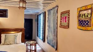 Postel nebo postele na pokoji v ubytování Riad Dar Alma Fes