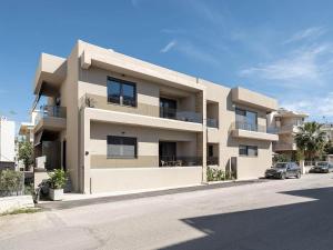 a large apartment building on the side of a street at Casa D'Irene Apts in Chania
