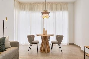 A seating area at Soho Apartments in Malaga by Solaga Holiday Homes