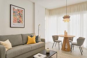 A seating area at Soho Apartments in Malaga by Solaga Holiday Homes