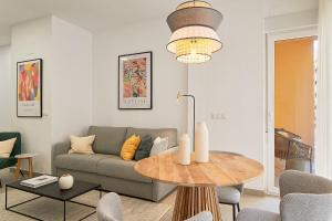 A seating area at Soho Apartments in Malaga by Solaga Holiday Homes