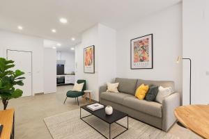 A seating area at Soho Apartments in Malaga by Solaga Holiday Homes