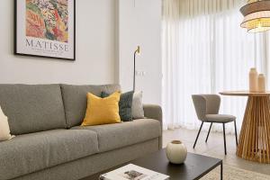 A seating area at Soho Apartments in Malaga by Solaga Holiday Homes