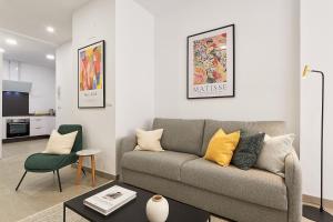 A kitchen or kitchenette at Soho Apartments in Malaga by Solaga Holiday Homes
