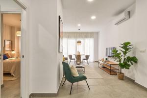 Postel nebo postele na pokoji v ubytování Soho Apartments in Malaga by Solaga Holiday Homes