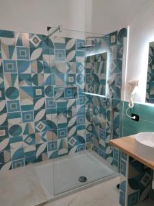 Kúpeľňa v ubytovaní Dante Rooms