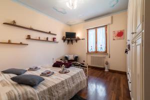 Ένα ή περισσότερα κρεβάτια σε δωμάτιο στο Casa Al Vento +21 φωτογραφίες