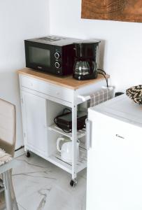 Kuchyň nebo kuchyňský kout v ubytování Apartments Potočki