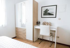 Postel nebo postele na pokoji v ubytování Apartments Potočki