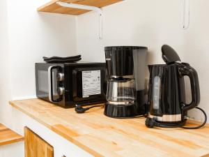 Kaffee-/Teezubehör in der Unterkunft Ferienwohnungen Merl
