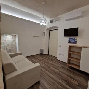 TV a/nebo společenská místnost v ubytování B&B Il Rosone