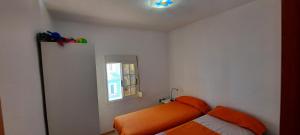 Łóżko lub łóżka w pokoju w obiekcie POS, Apartamento pesquero en primera linea