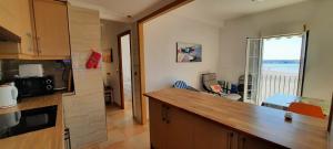 Kuchnia lub aneks kuchenny w obiekcie POS, Apartamento pesquero en primera linea