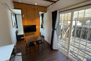 Et tv og/eller underholdning på 富士山下Trailer House-A