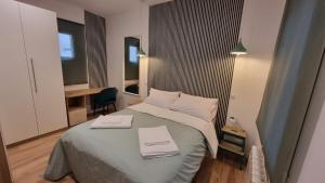 A bed or beds in a room at Apartamento en pleno centro