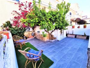 Vonkajšia záhrada v ubytovaní Rincon Mediterraneo Gran Alacant