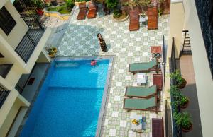an overhead view of a swimming pool in a building at Windbell Villa Hoi An in Hoi An