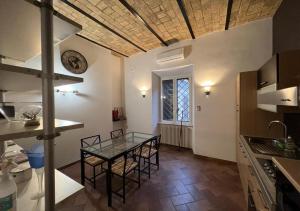 A kitchen or kitchenette at StarHome San Paolo