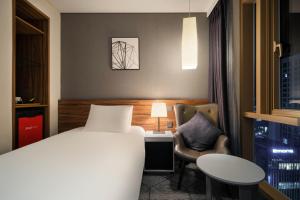 Staz Hotel Ulsan客房内的一张或多张床位